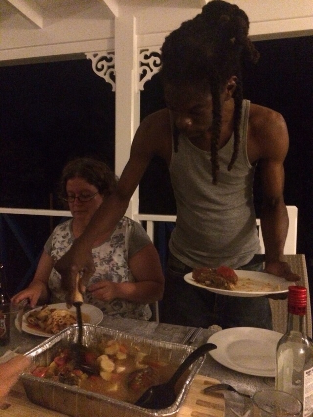 Shawn dishing up dinner, and me getting ready to eat it!